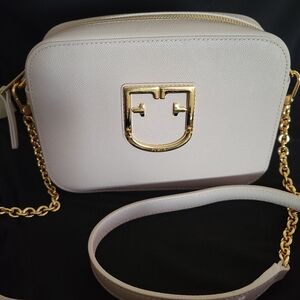 Furla crossbody camera bag. Beige color with gold hardware.